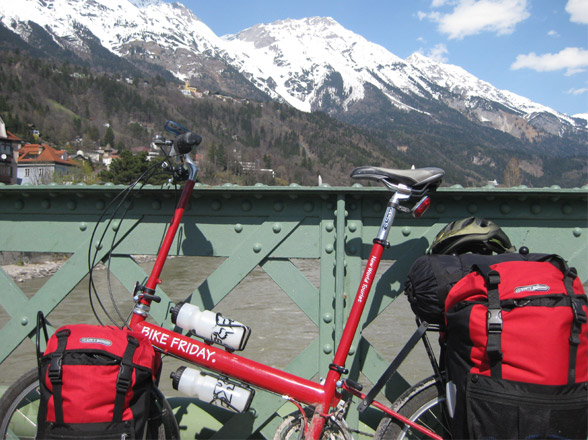 red bike friday new world tourist on bridge in austria