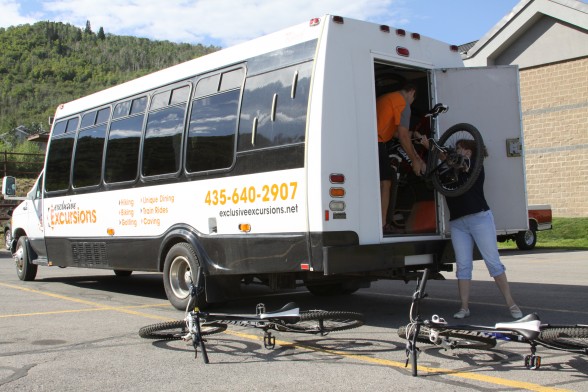 Exclusive Excursions shuttle bus - unloading bicycles