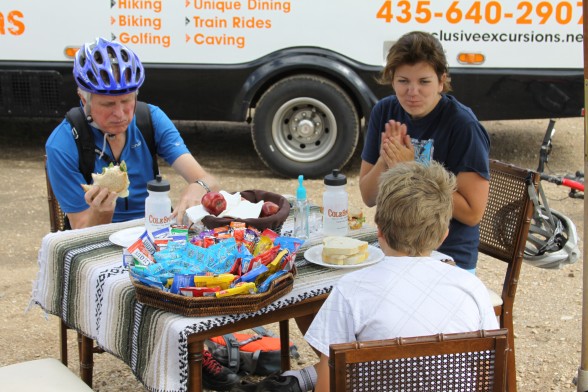family eating lunch after their bike tour