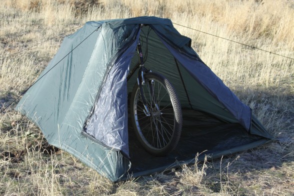 Bicycle holding up tent