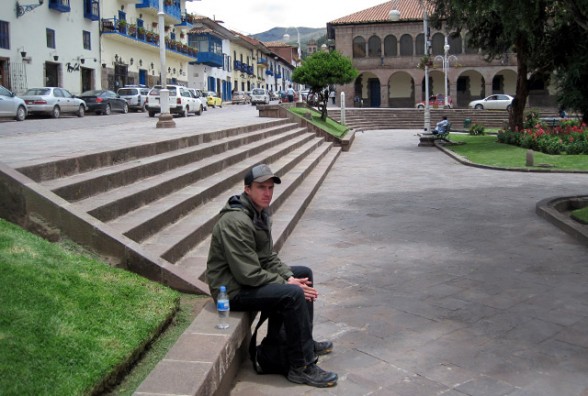darren alff sitting in a cusco peru plaza