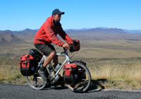 Darren Alff riding his touring bicycle in South Africa