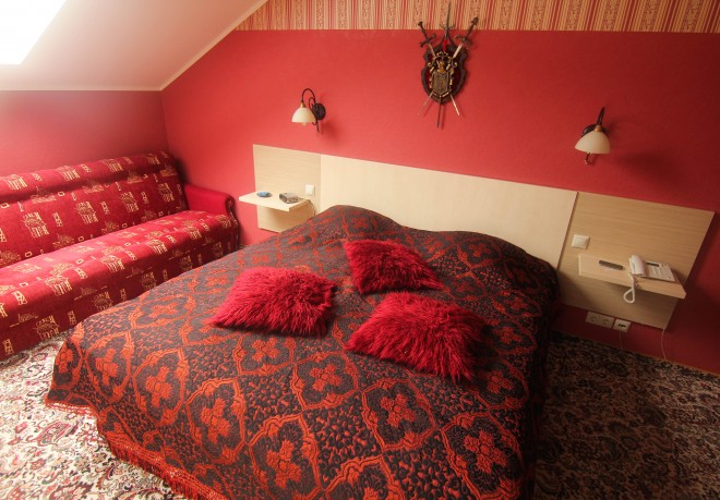 Red sexy bedroom in Latvian hotel
