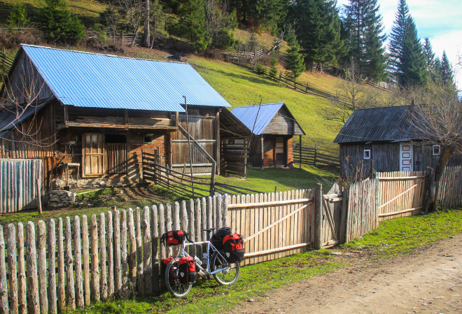 small-wooden-house-touring-bicycle-red