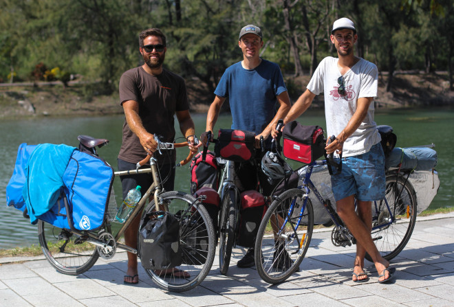 three young men on self-supported bicycle touring adventures