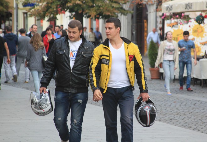 two young beefy men in motorcycle jackets