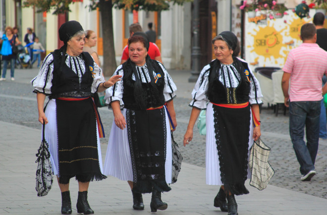 three old women in traditional romanian dresses