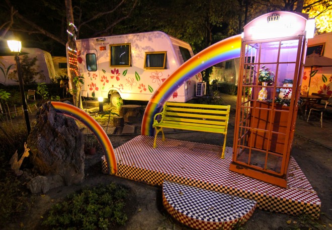 themed RV park with rainbow telephone booth