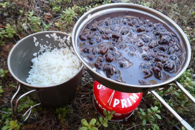 Cookign beans and rice on camp stove