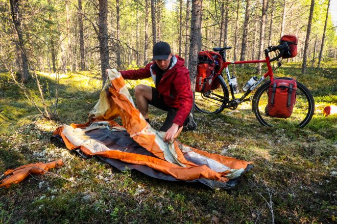 Pitching a tent on a bike tour