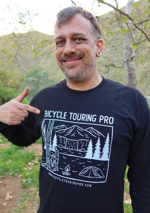 Bicycle Touring Pro: Wild Camping T-Shirt modeled on middle-age man